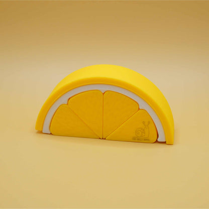 luminous lemon silicone stacking toy put together